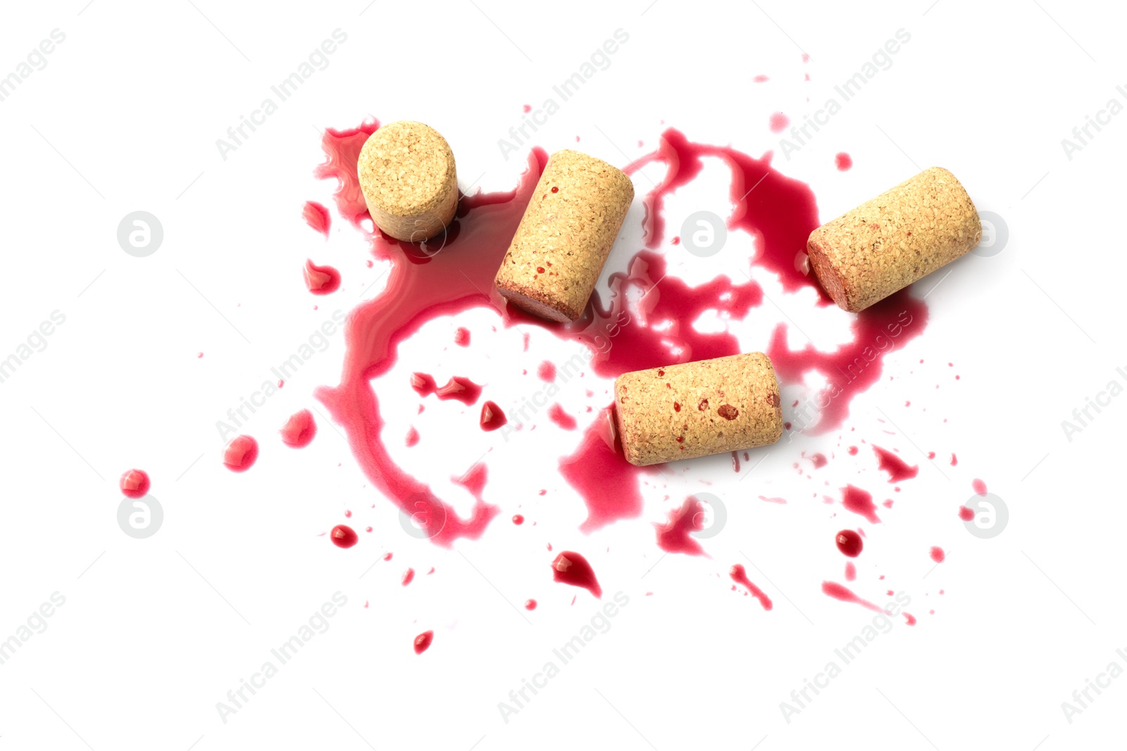 Photo of Bottle corks with wine stains on white background, top view