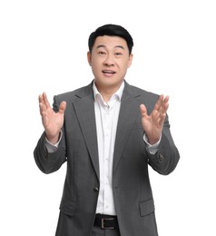 Businessman in suit posing on white background