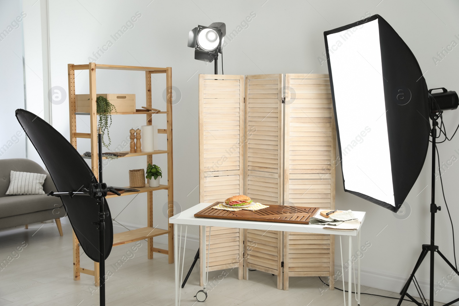 Photo of Tasty sandwich on table in photo studio. Food photography