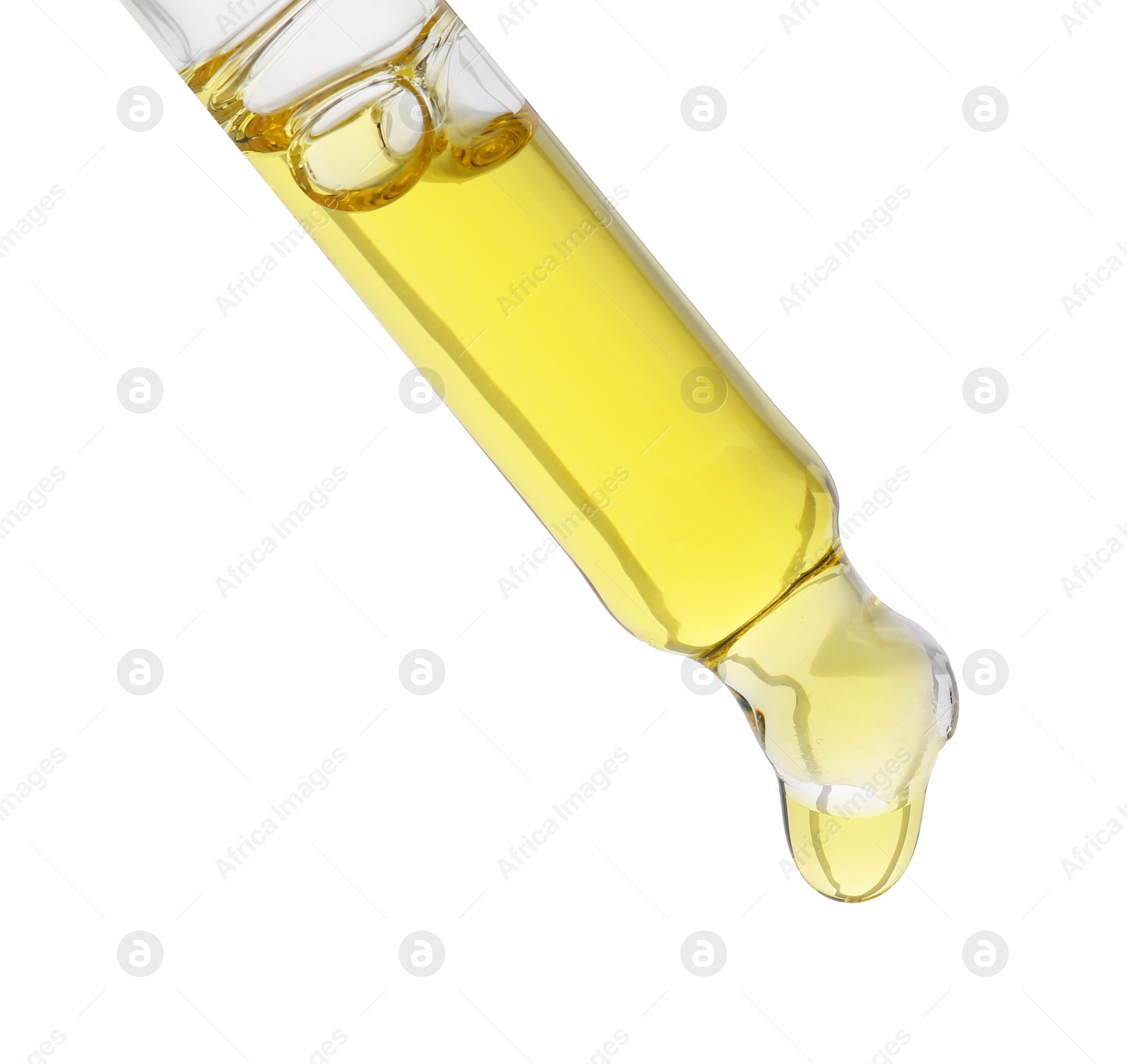 Photo of Dripping tincture from pipette isolated on white