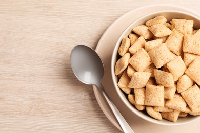 Photo of Delicious corn pads served on light wooden table, top view. Space for text