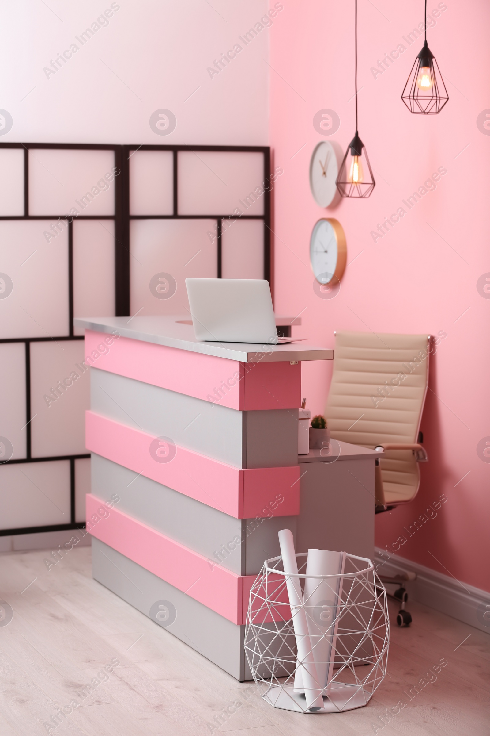 Photo of Reception desk in beauty salon. Stylish interior