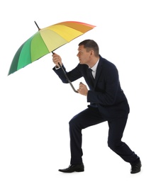 Photo of Businessman with rainbow umbrella on white background