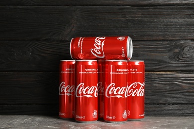 MYKOLAIV, UKRAINE - NOVEMBER 15, 2018: Coca Cola cans on table