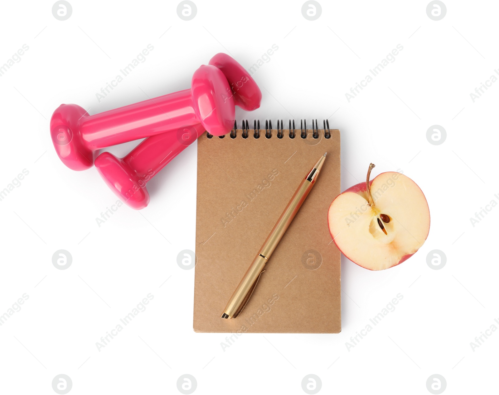 Photo of Healthy diet. Notebook, pen, cut apple and dumbbells isolated on white, top view