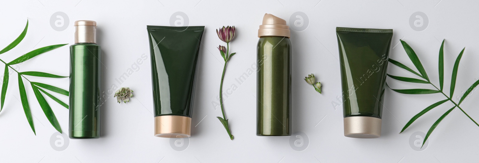 Photo of Flat lay composition with cosmetic products on white background