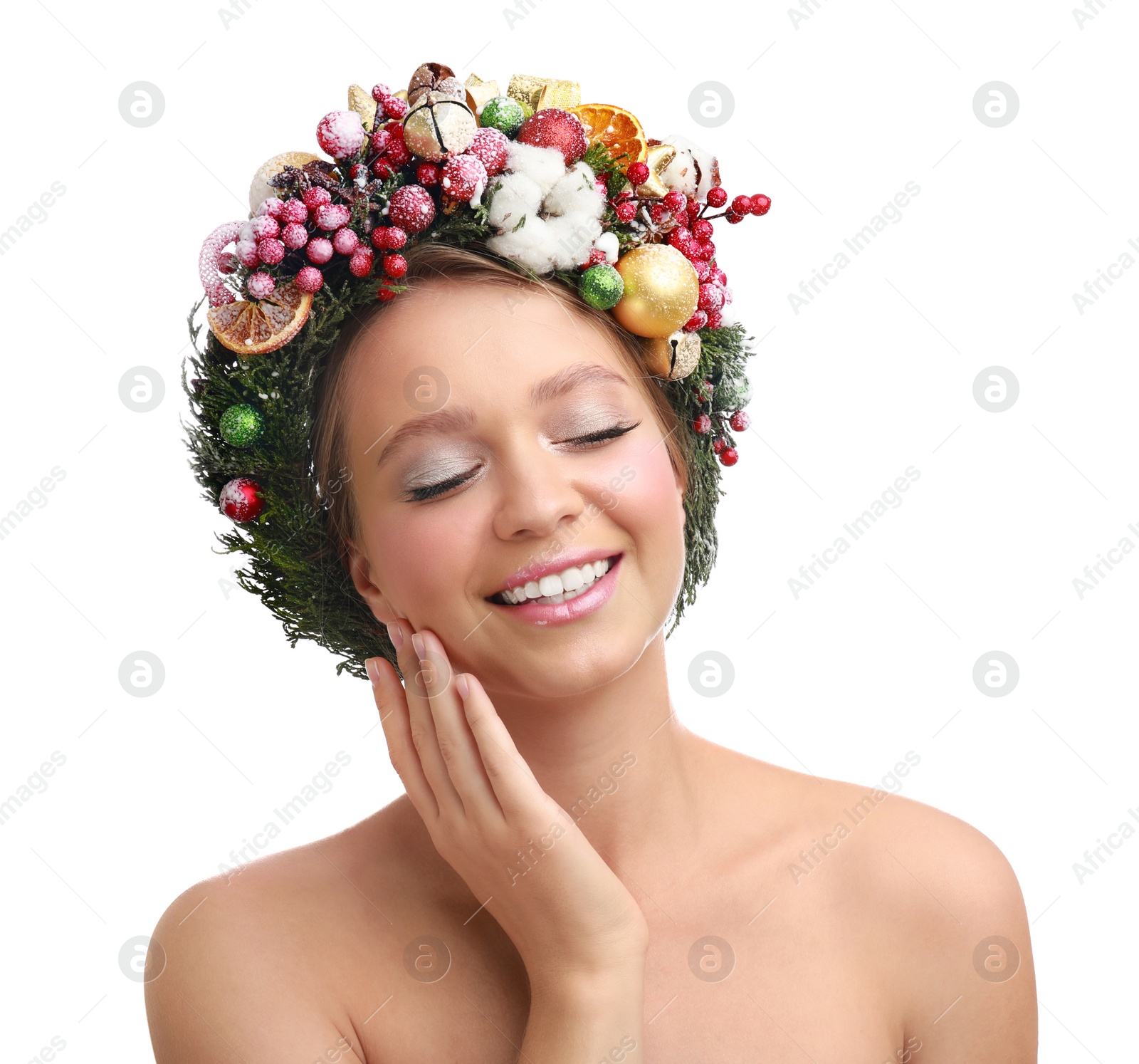 Photo of Beautiful young woman wearing Christmas wreath on white background