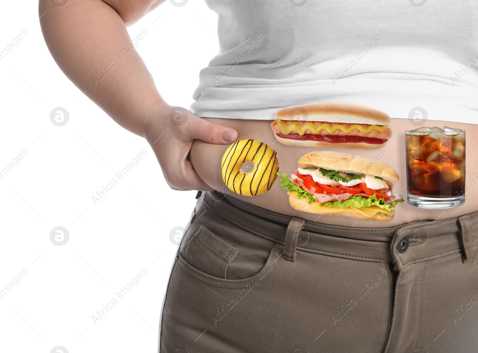 Image of Overweight woman in tight shirt and trousers with images of different unhealthy food on her belly against white background, closeup