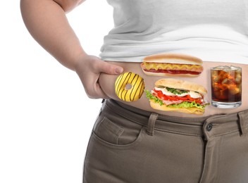 Image of Overweight woman in tight shirt and trousers with images of different unhealthy food on her belly against white background, closeup