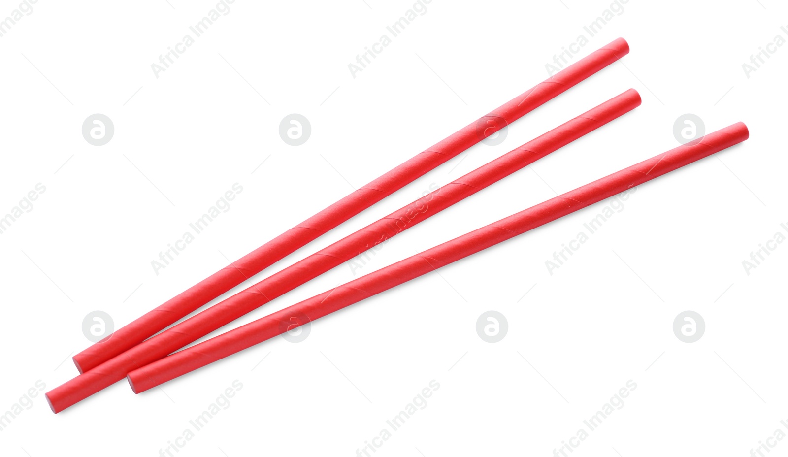 Photo of Red paper cocktail straws on white background