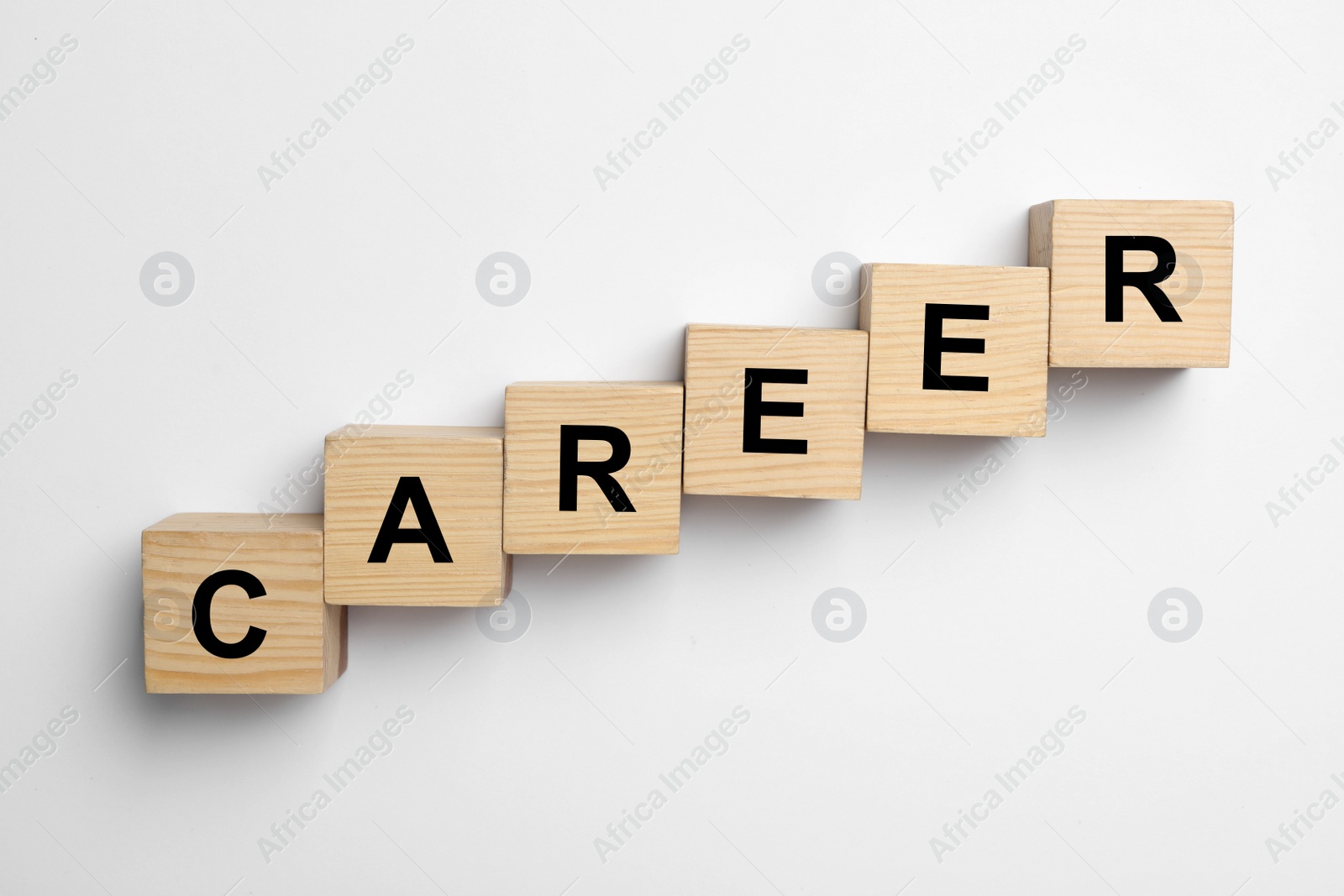 Photo of Wooden cubes with word CAREER on white background, top view