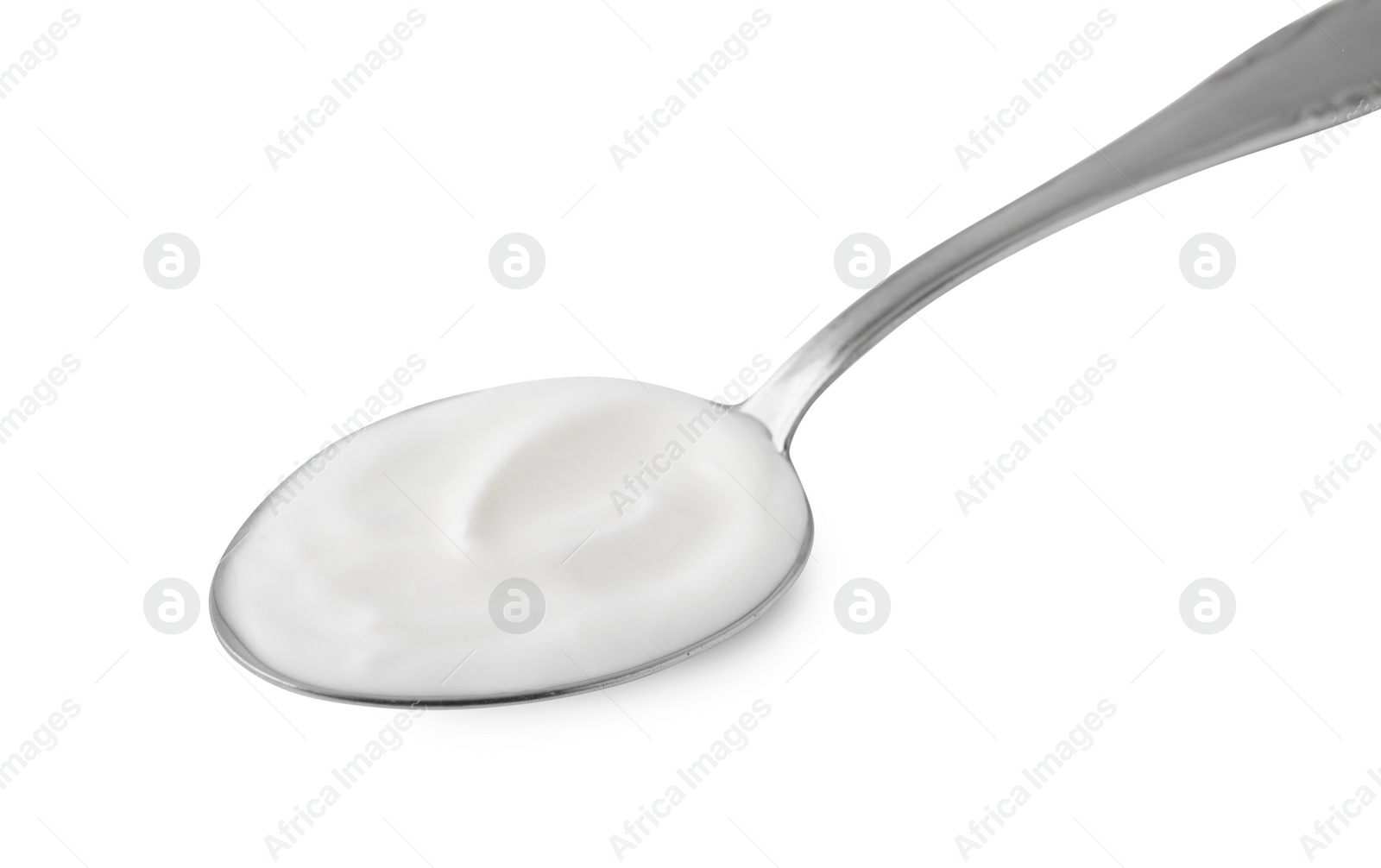 Photo of Delicious natural yogurt in spoon isolated on white