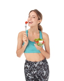 Photo of Happy slim woman in sportswear with salad on white background. Weight loss diet