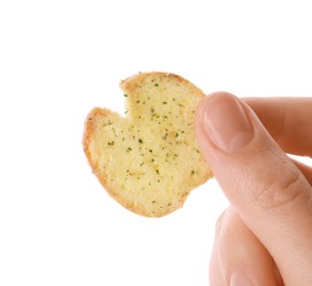 Woman holding crispy rusk on white background, closeup