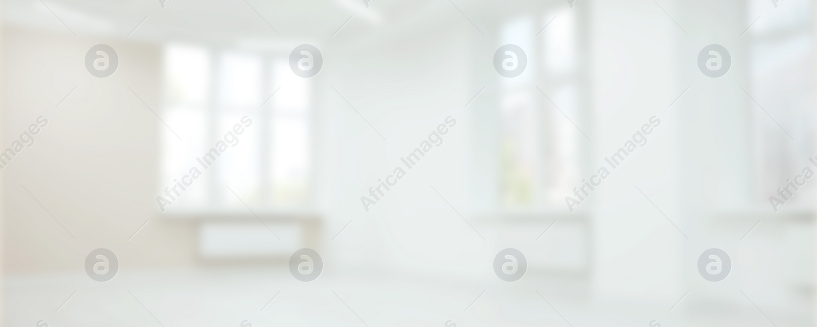 Image of Empty room with white walls and large windows, blurred view. Banner design