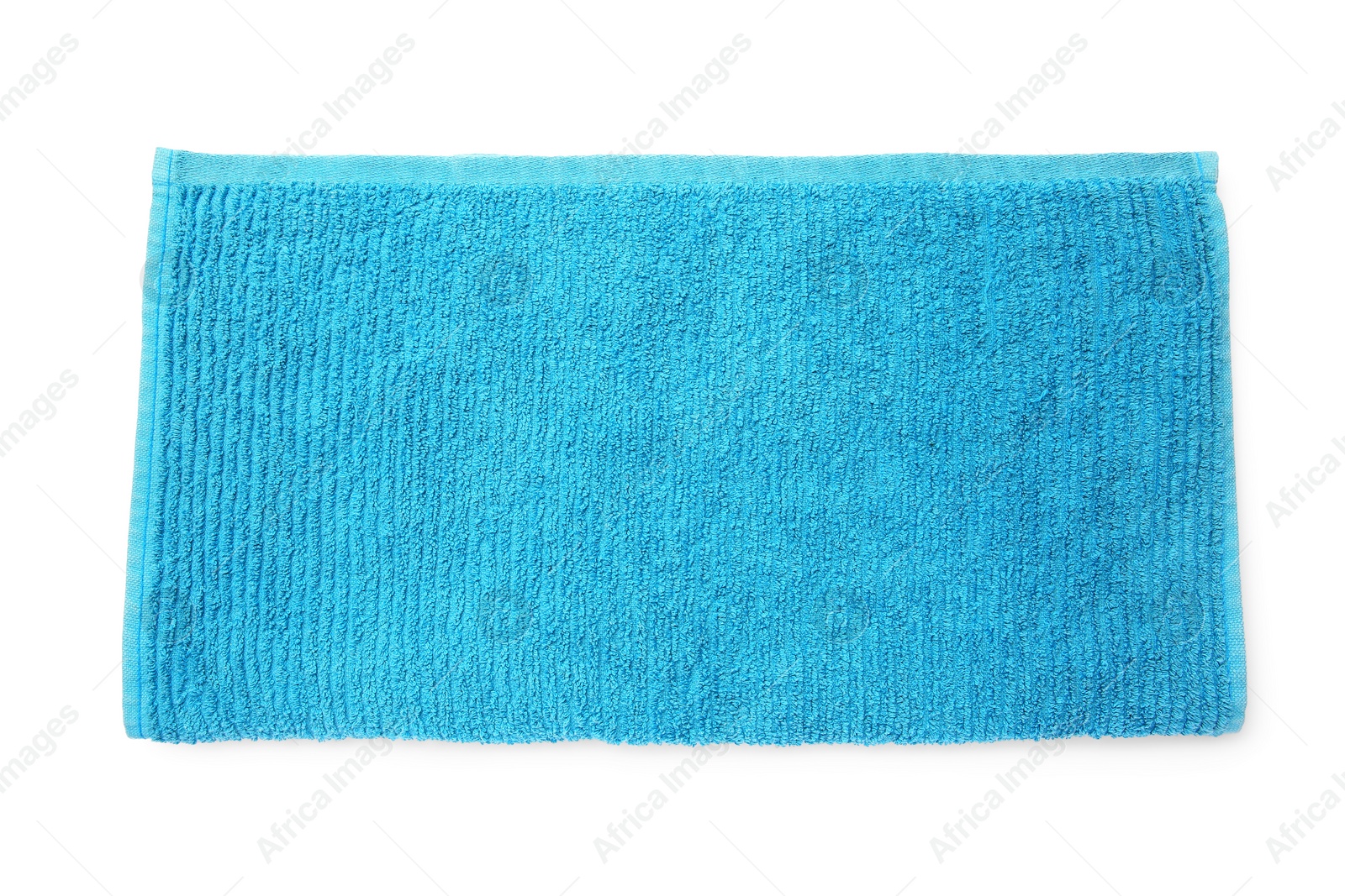 Photo of Soft blue terry towel isolated on white, top view