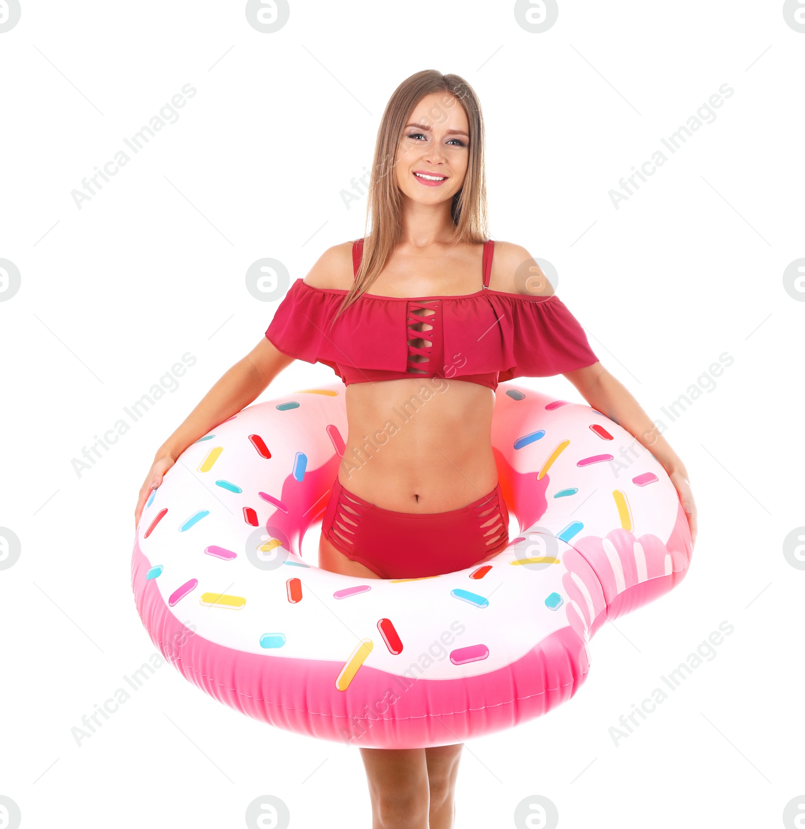 Photo of Sexy young woman in bikini with inflatable ring on white background