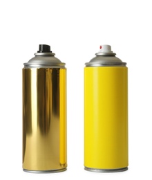 Cans of different spray paints on white background