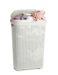 Photo of Plastic laundry basket full of dirty clothes on white background