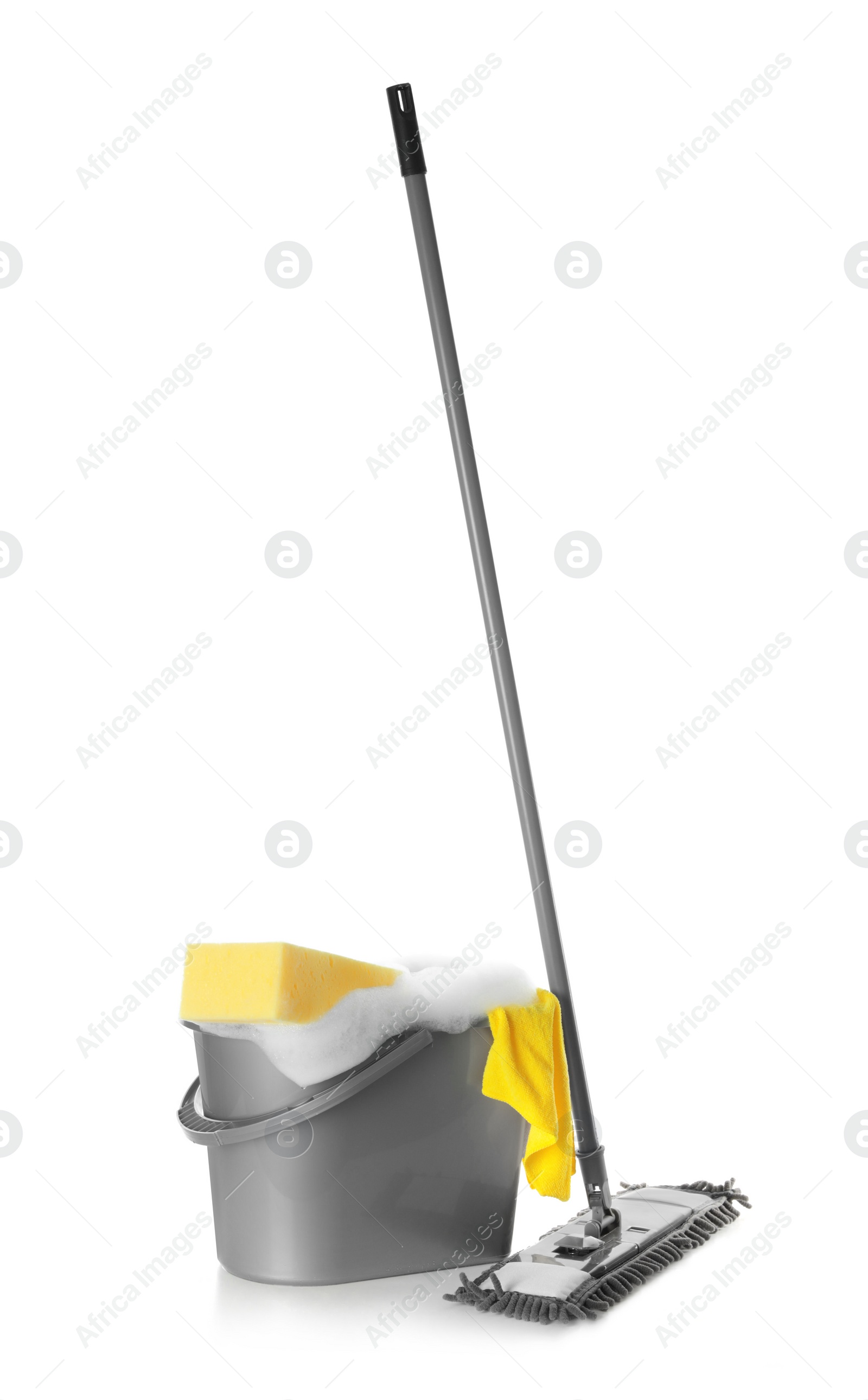 Photo of Plastic bucket with foam and cleaning supplies on white background