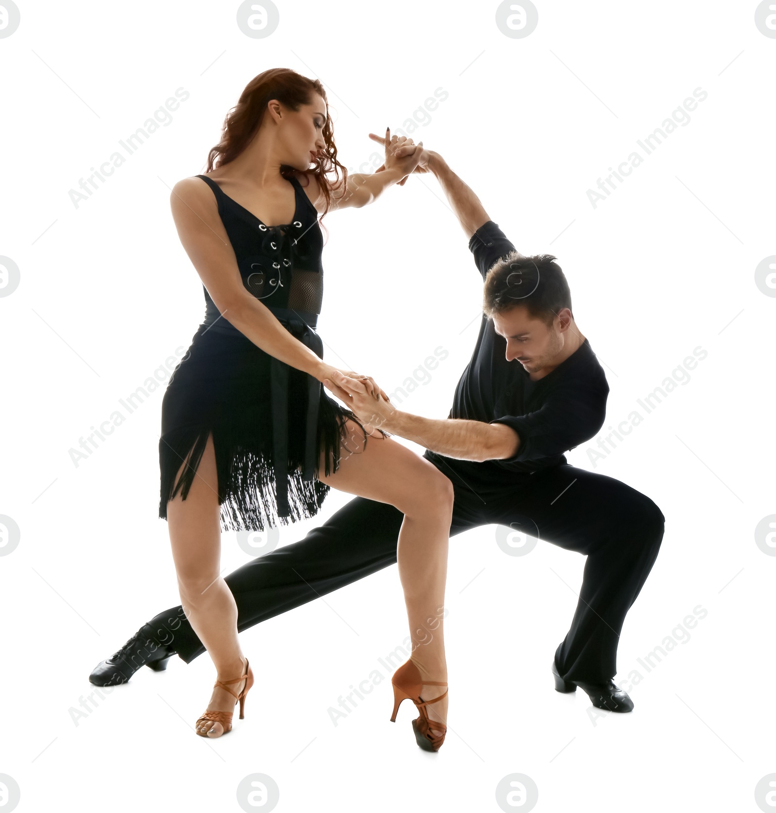 Photo of Passionate young couple dancing on white background