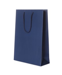 Photo of One dark blue shopping bag isolated on white