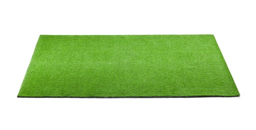 Photo of Green artificial grass carpet isolated on white