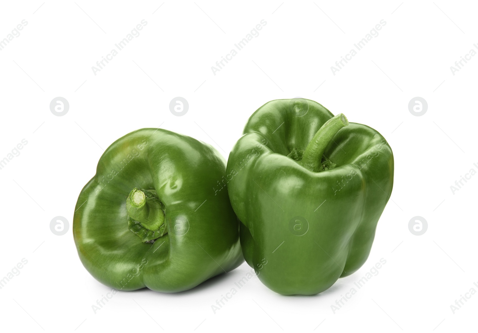 Photo of Raw ripe paprika peppers on white background