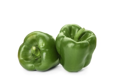 Photo of Raw ripe paprika peppers on white background