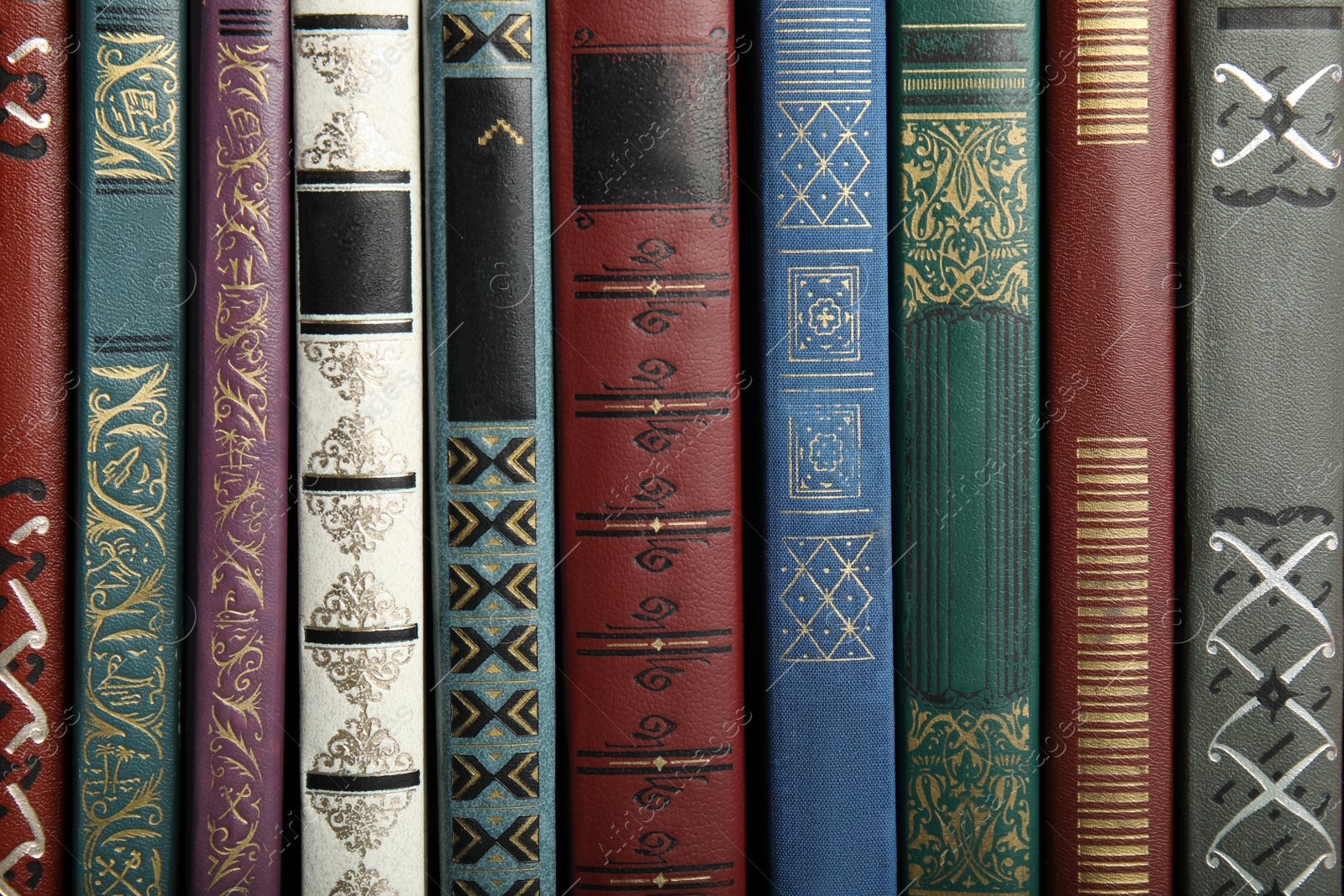 Photo of Collection of different old books as background