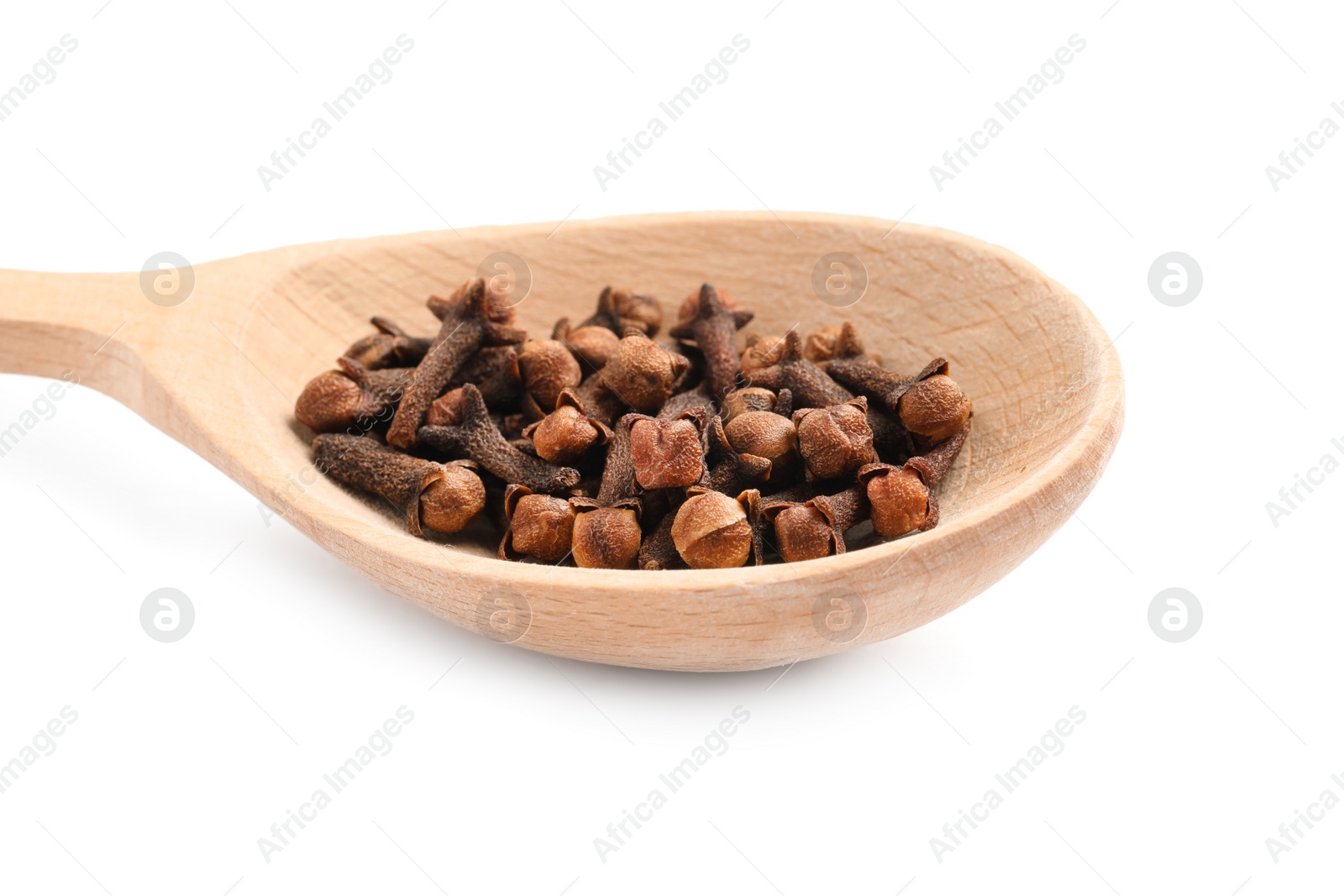 Photo of Wooden spoon with aromatic dry cloves isolated on white