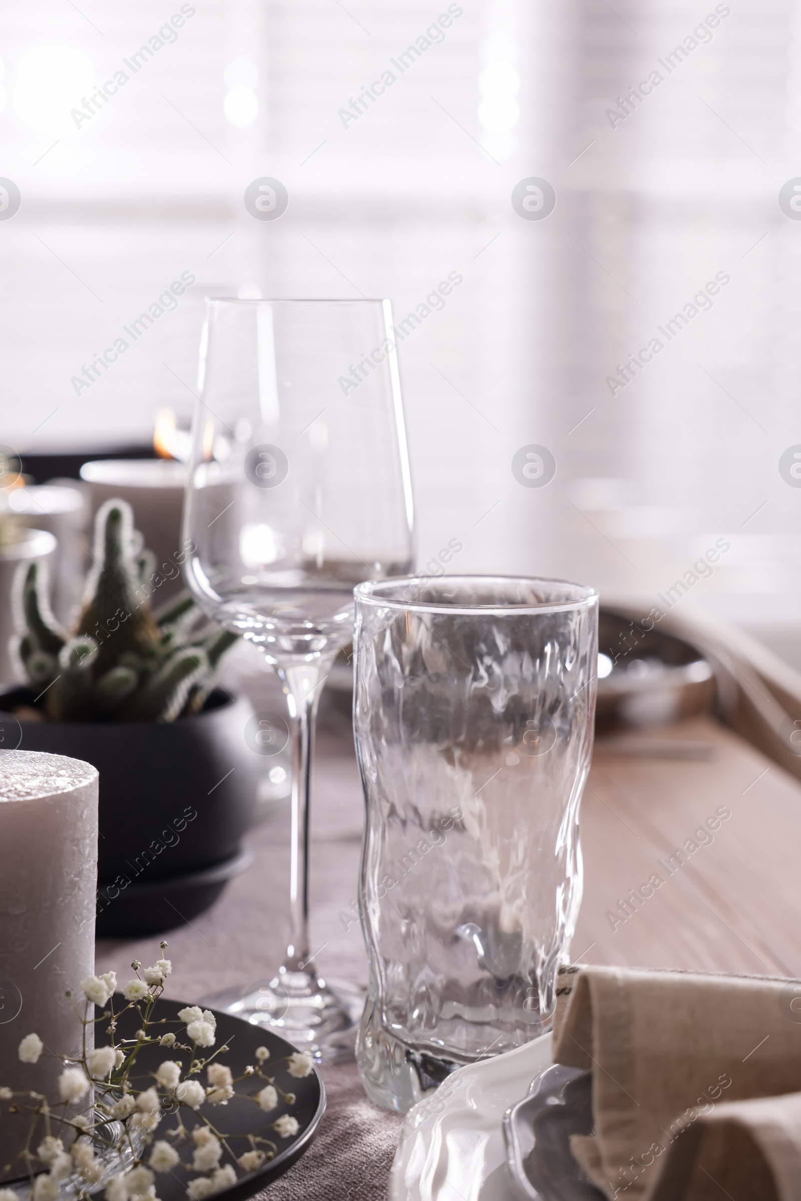 Photo of Festive table setting with beautiful tableware and decor indoors