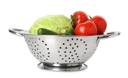 Photo of Metal colander with different vegetables isolated on white