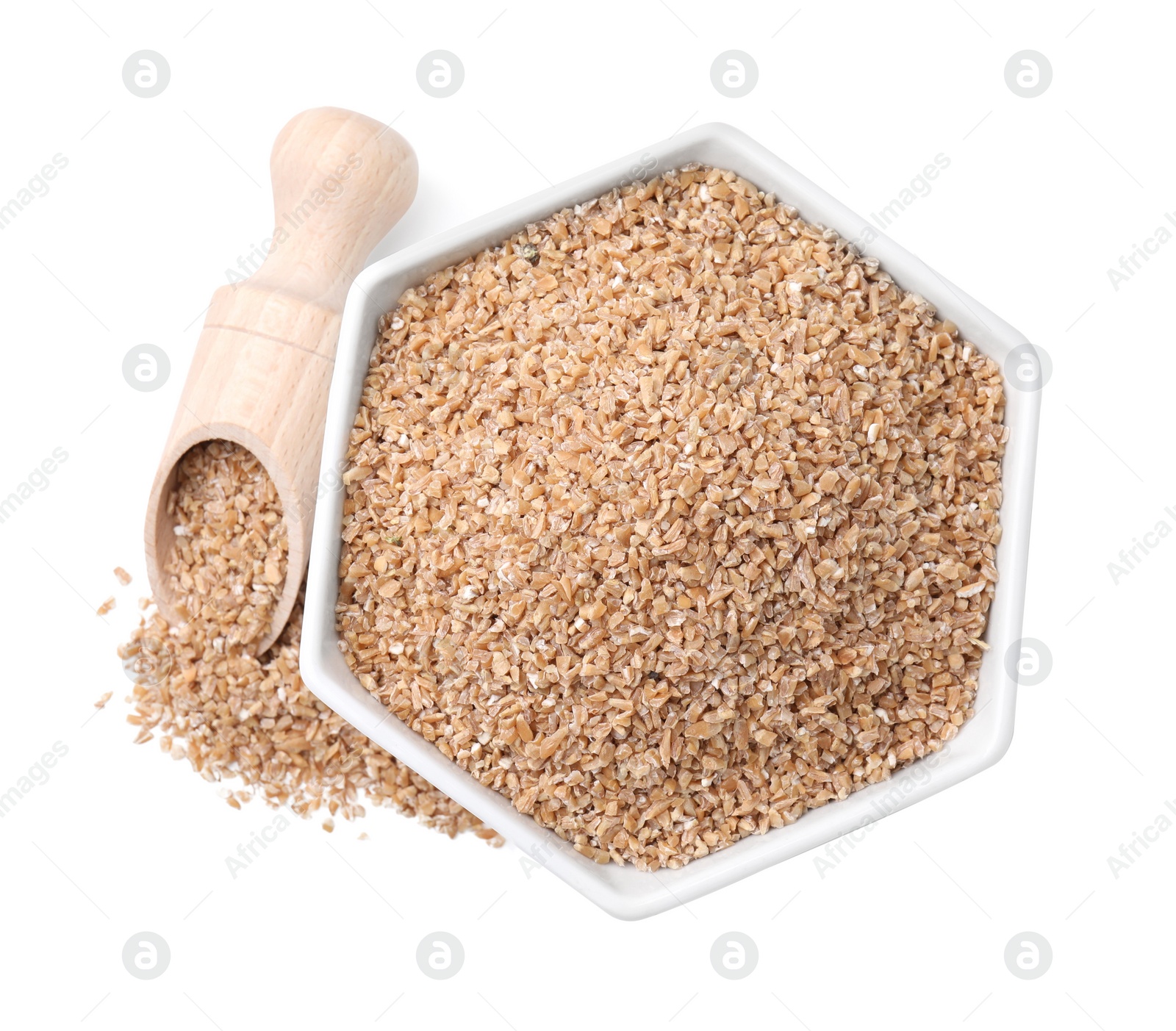 Photo of Dry wheat groats in bowl and scoop isolated on white, top view