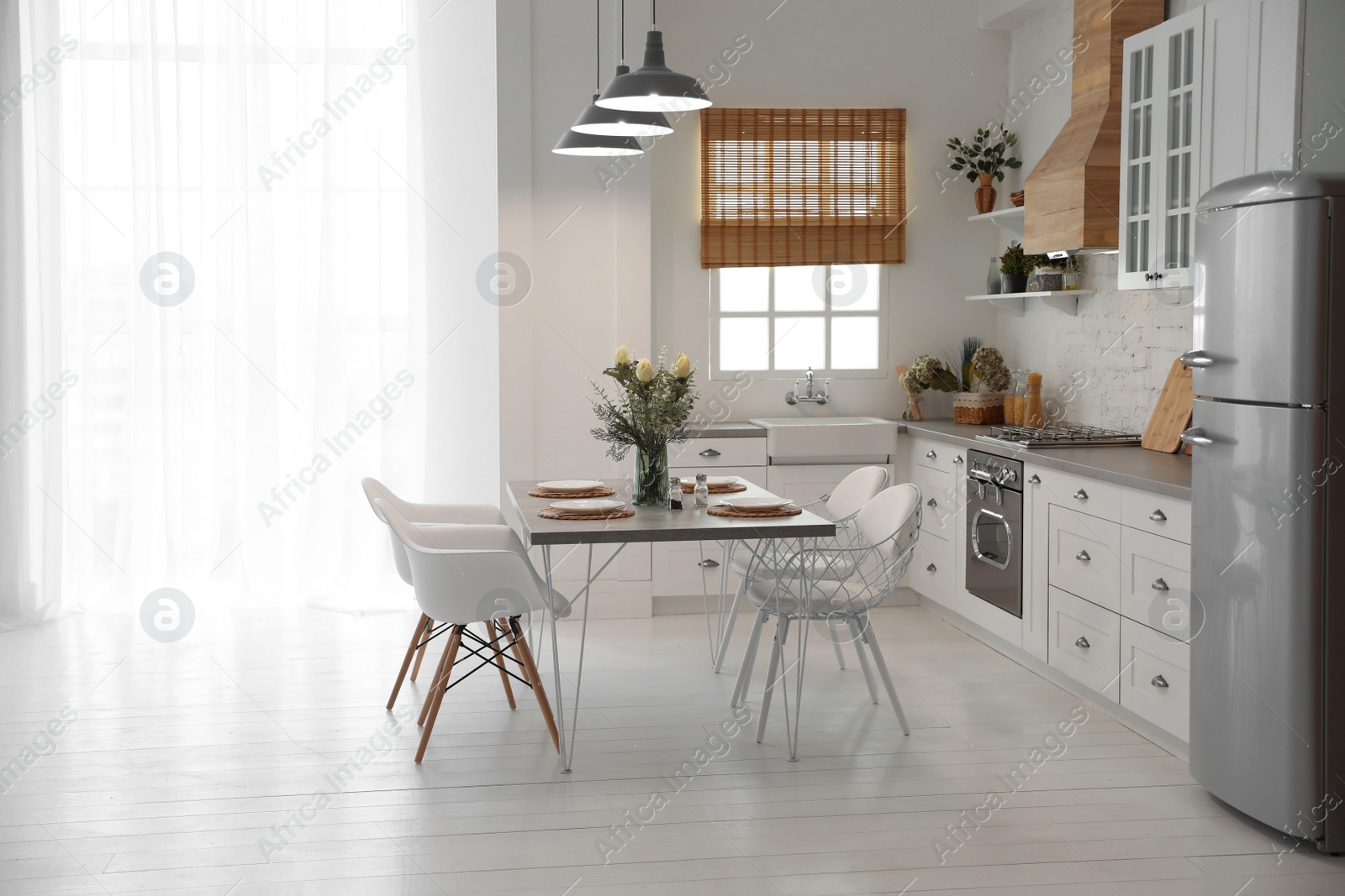 Photo of Beautiful kitchen interior with new stylish furniture