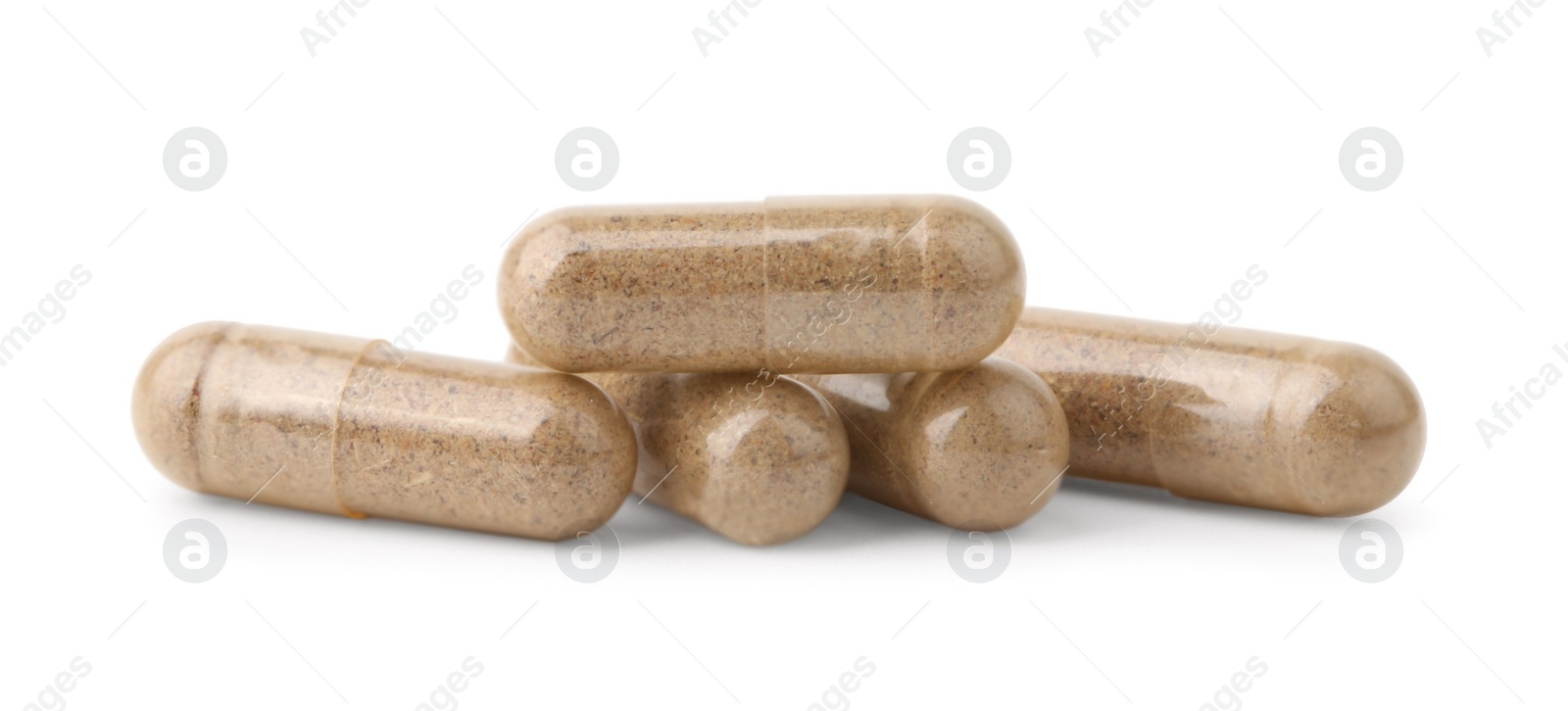 Photo of Pile of vitamin capsules isolated on white