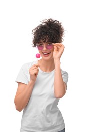 Beautiful woman in sunglasses with lollipop on white background