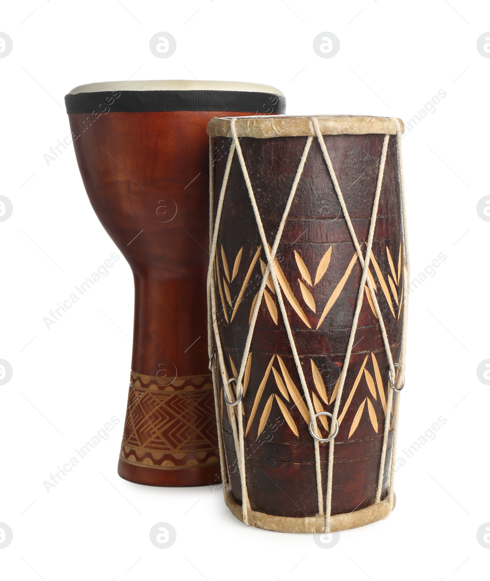 Photo of Vintage hand drums isolated on white. Percussion musical instruments