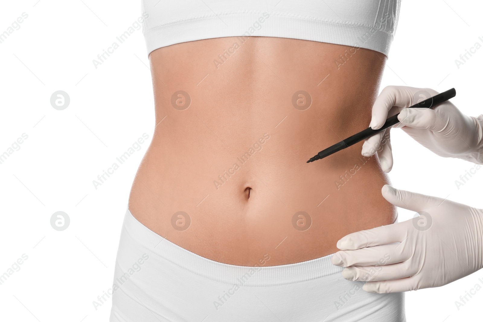 Photo of Doctor holding marker near young woman's body isolated on white, closeup. Plastic surgery concept