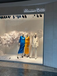 WARSAW, POLAND - JULY 17, 2022: Massimo Dutti store display with women clothes on mannequins in shopping mall