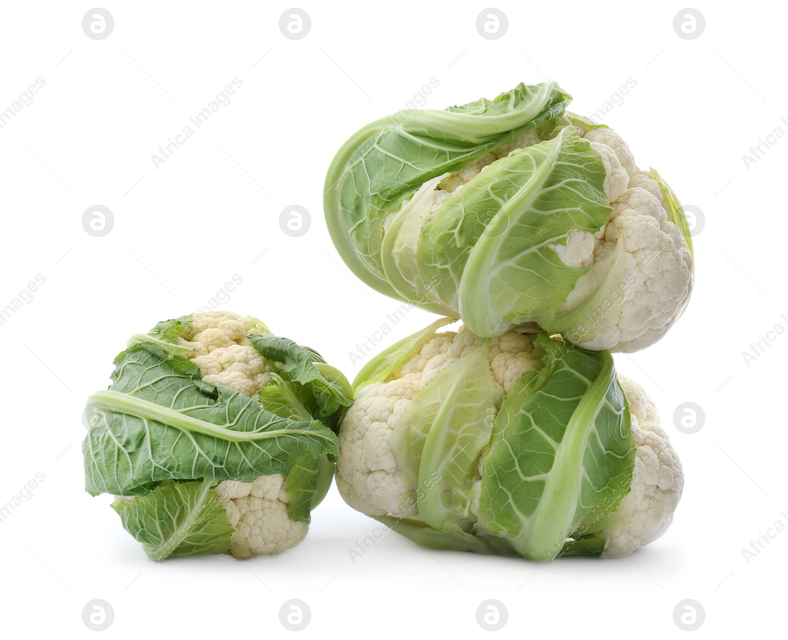 Photo of Whole fresh raw cauliflowers isolated on white