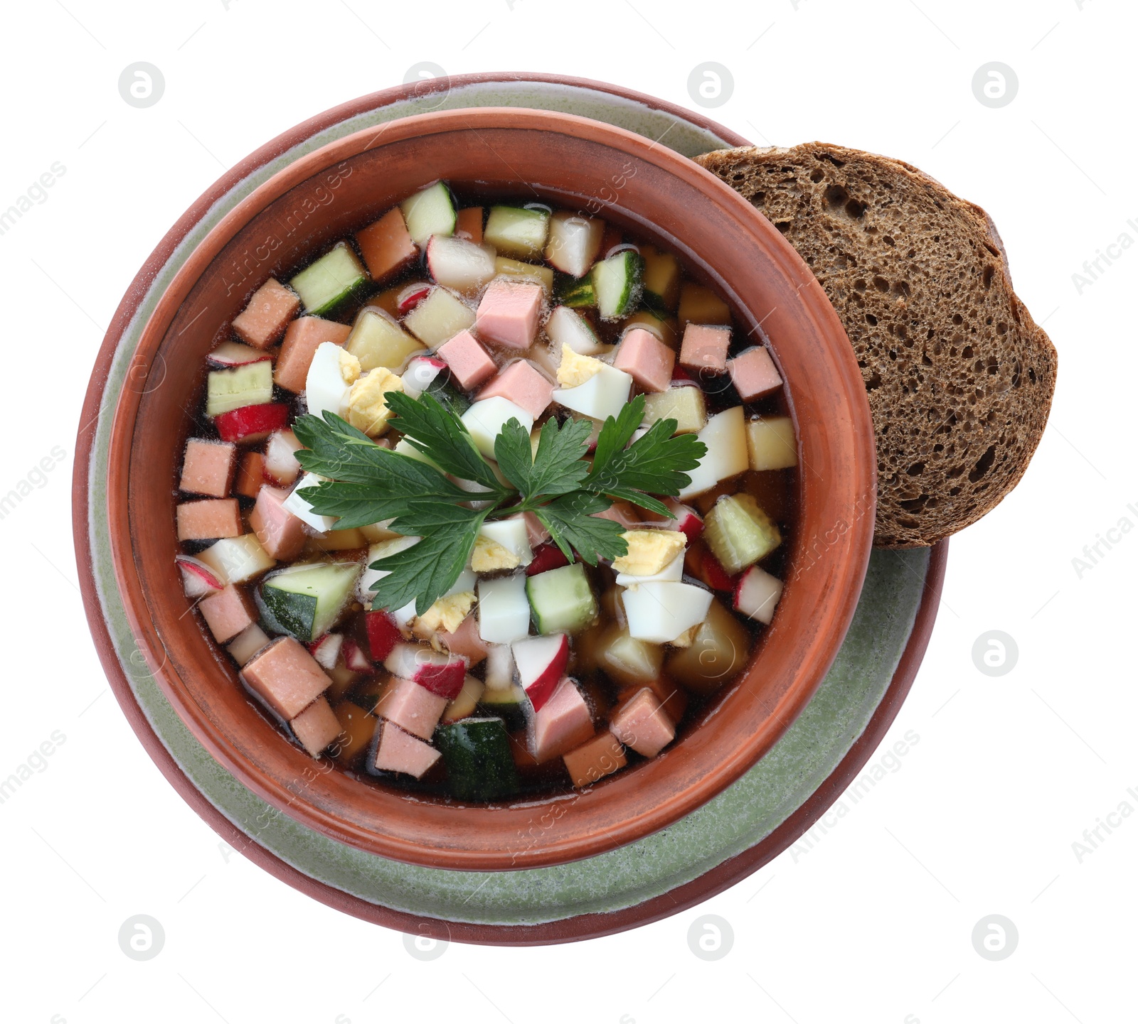 Photo of Delicious cold okroshka with kvass isolated on white, top view. Traditional Russian summer soup