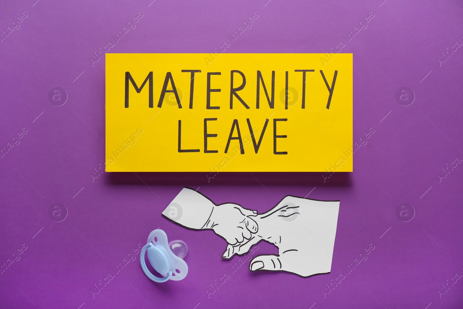 Photo of Note with words Maternity Leave, baby pacifier and paper cutout of hands on purple background, flat lay