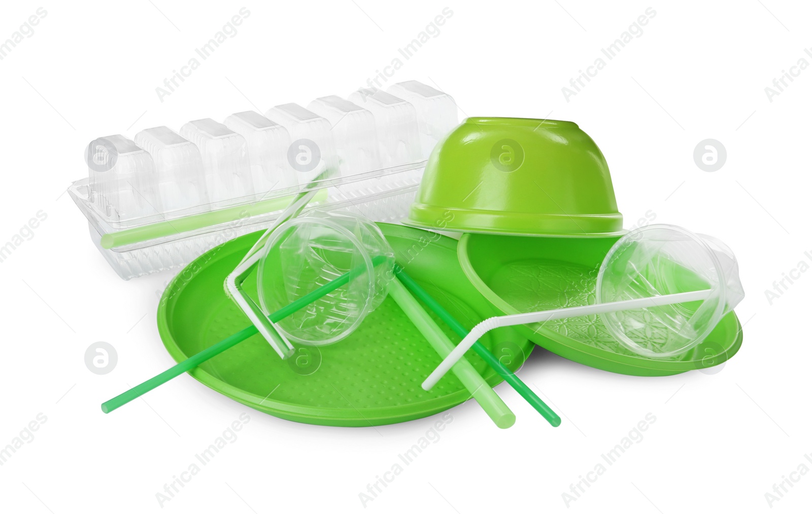 Photo of Pile of different plastic items on white background