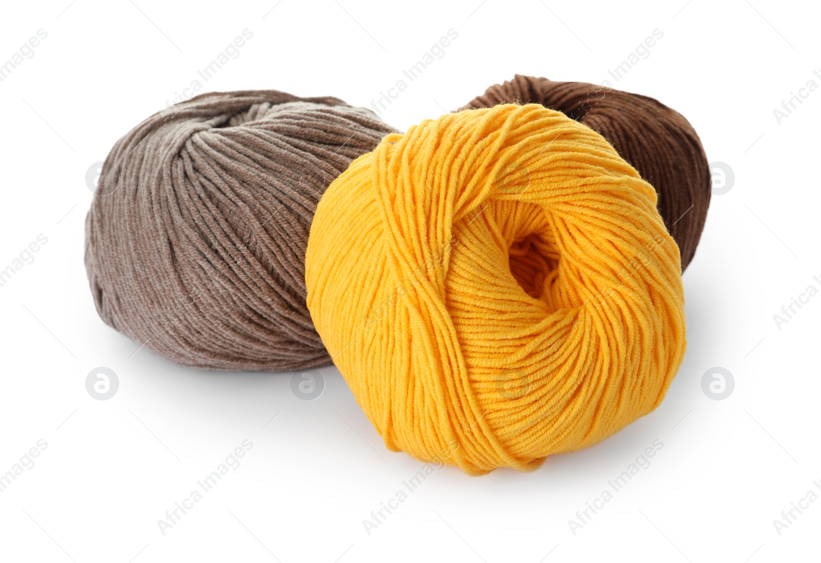 Photo of Soft colorful woolen yarns on white background