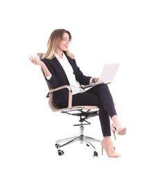Photo of Young businesswoman with laptop sitting in office chair on white background
