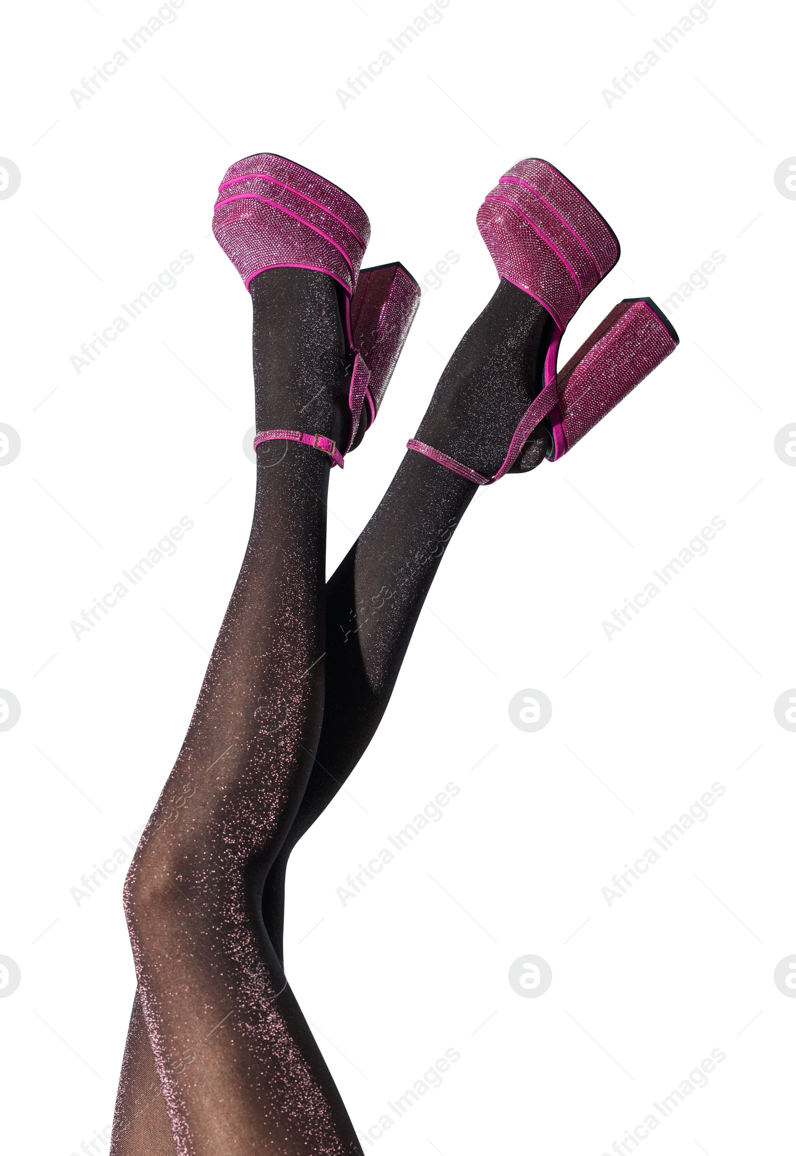 Photo of Woman wearing pink high heeled shoes with platform and square toes on light grey background, closeup