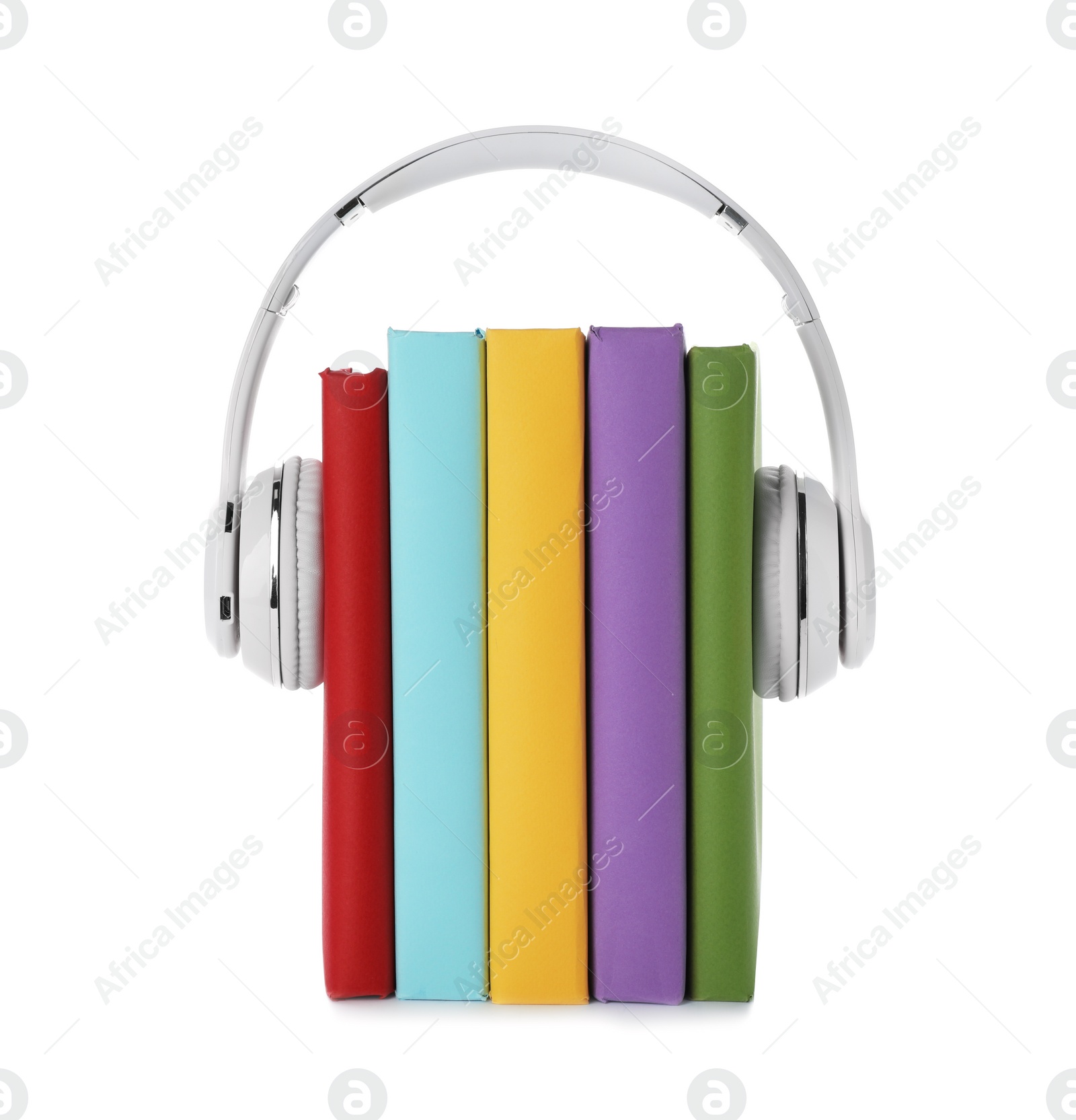 Photo of Modern headphones with hardcover books on white background