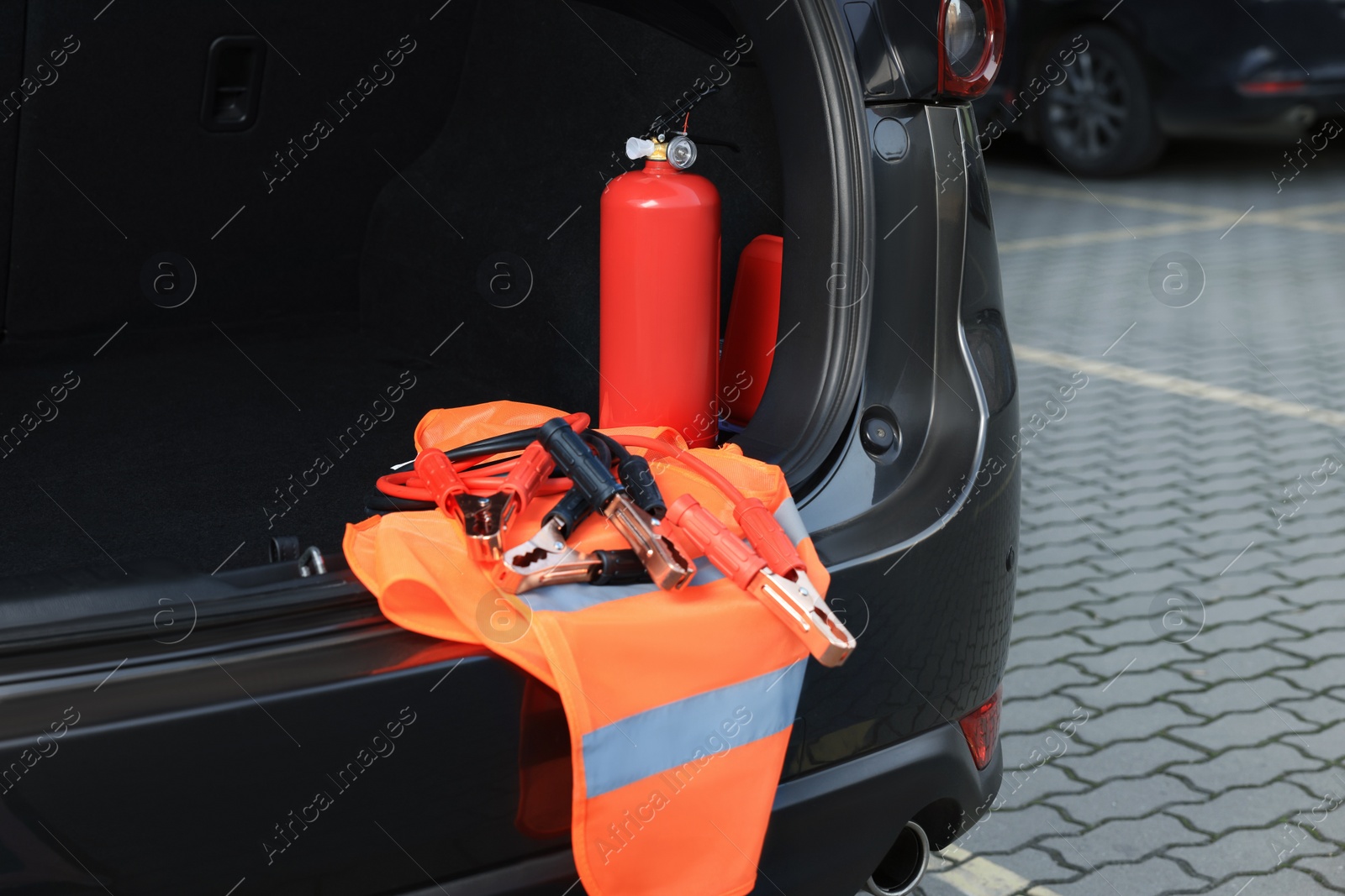 Photo of Set of car safety equipment in trunk