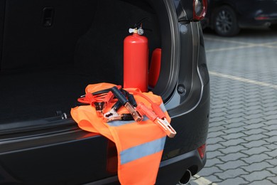 Set of car safety equipment in trunk